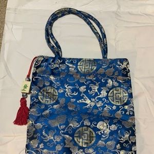 Blue embroidered purse